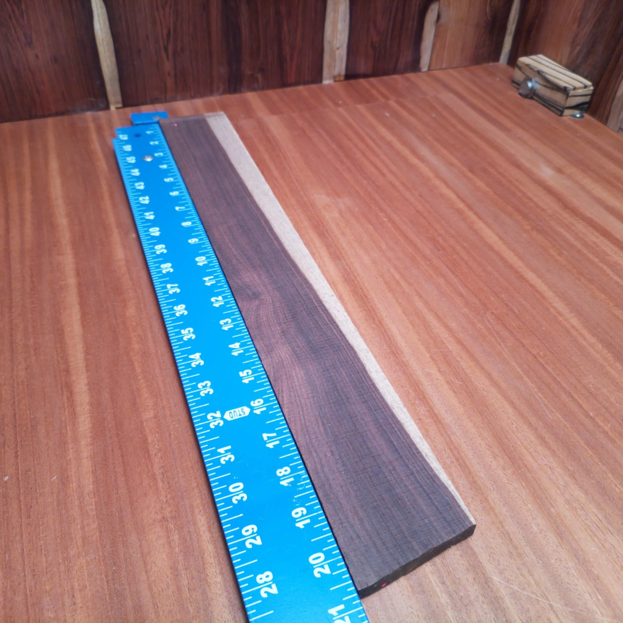 Amazon Rosewood Acoustic Quarter Sawn Fingerboard Blank 0.4" X 2.4" X 20.5" - ARAFBQ000664 2 Unlock your creativity with this quarter-sawn Amazon Rosewood blank, perfect for crafting stunning acoustic instruments. This premium wood boasts a rich sound and beautiful grain, making it ideal for luthiers who demand quality. Features a 0.4-inch thickness, making it easy to work with while crafting your next masterpiece! With durability and excellent tonal qualities, elevate your projects with this essential fingerboards blank. It is a Amazon Rosewood Acoustic Quarter Sawn fingerboard blank with dimensions of 20.5 x 2.4 x 0.4 inches.
