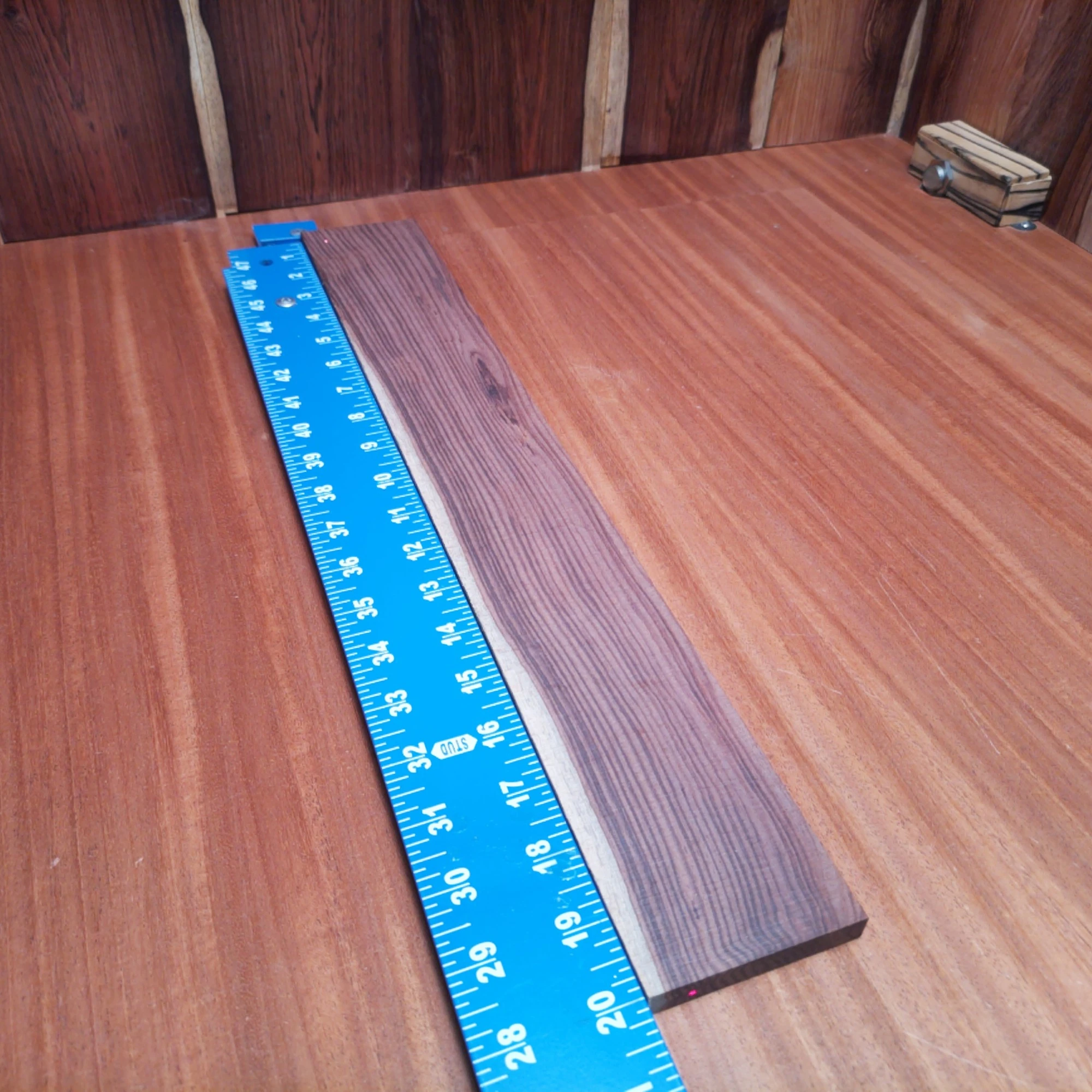 Amazon Rosewood Acoustic Quarter Sawn Fingerboard Blank 0.4" X 2.8" X 20.0" - ARAFBQ000669 1 Unlock the potential of your next acoustic project with this premium quarter-sawn Amazon Rosewood blank. Its rich tonal qualities make it an excellent choice for crafting instruments that sing. The dense grain structure not only looks stunning, but it also enhances sustain and clarity, making it ideal for luthiers aiming for that perfect sound. Whether you're building a guitar, ukulele, or other string instrument, this fingerboard blank will elevate your craftsmanship to new heights. It is a Amazon Rosewood Acoustic Quarter Sawn fingerboard blank with dimensions of 20.0 x 2.8 x 0.4 inches.
