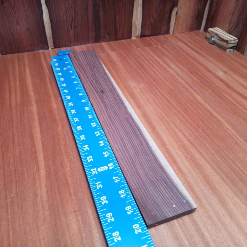 Amazon Rosewood Acoustic Quarter Sawn Fingerboard Blank 0.4" X 2.8" X 20.0" - ARAFBQ000669 3 Unlock the potential of your next acoustic project with this premium quarter-sawn Amazon Rosewood blank. Its rich tonal qualities make it an excellent choice for crafting instruments that sing. The dense grain structure not only looks stunning, but it also enhances sustain and clarity, making it ideal for luthiers aiming for that perfect sound. Whether you're building a guitar, ukulele, or other string instrument, this fingerboard blank will elevate your craftsmanship to new heights. It is a Amazon Rosewood Acoustic Quarter Sawn fingerboard blank with dimensions of 20.0 x 2.8 x 0.4 inches.
