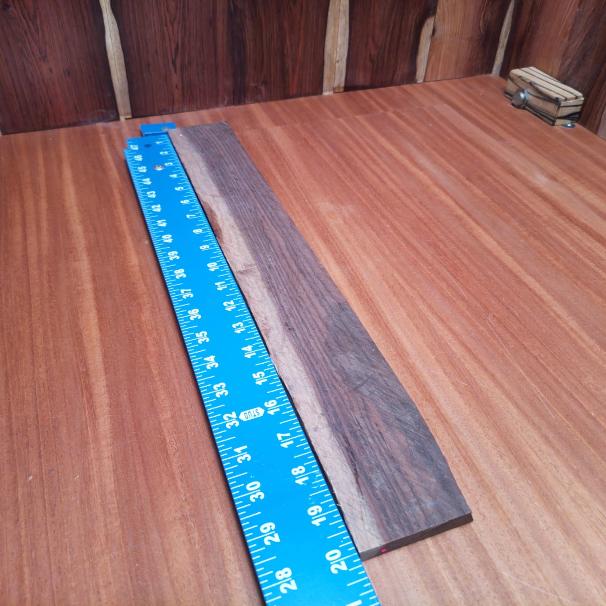 Amazon Rosewood Acoustic Rift Sawn Fingerboard Blank 0.4" X 2.6" X 20.0" - ARAFBR000668 2 Unleash your creativity with this top-quality acoustic fingerboard blank made from Amazon Rosewood. Crafted for luthiers seeking durability and stunning aesthetics, this blank is perfect for your next custom build. With its vibrant grain patterns and rich tonal properties, you’ll be able to carve out a masterpiece that resonates beautifully. Transform your ideas into reality and enjoy the craftsmanship that comes into play with this gorgeous wood! It is a Amazon Rosewood Acoustic Rift Sawn fingerboard blank with dimensions of 20.0 x 2.6 x 0.4 inches.