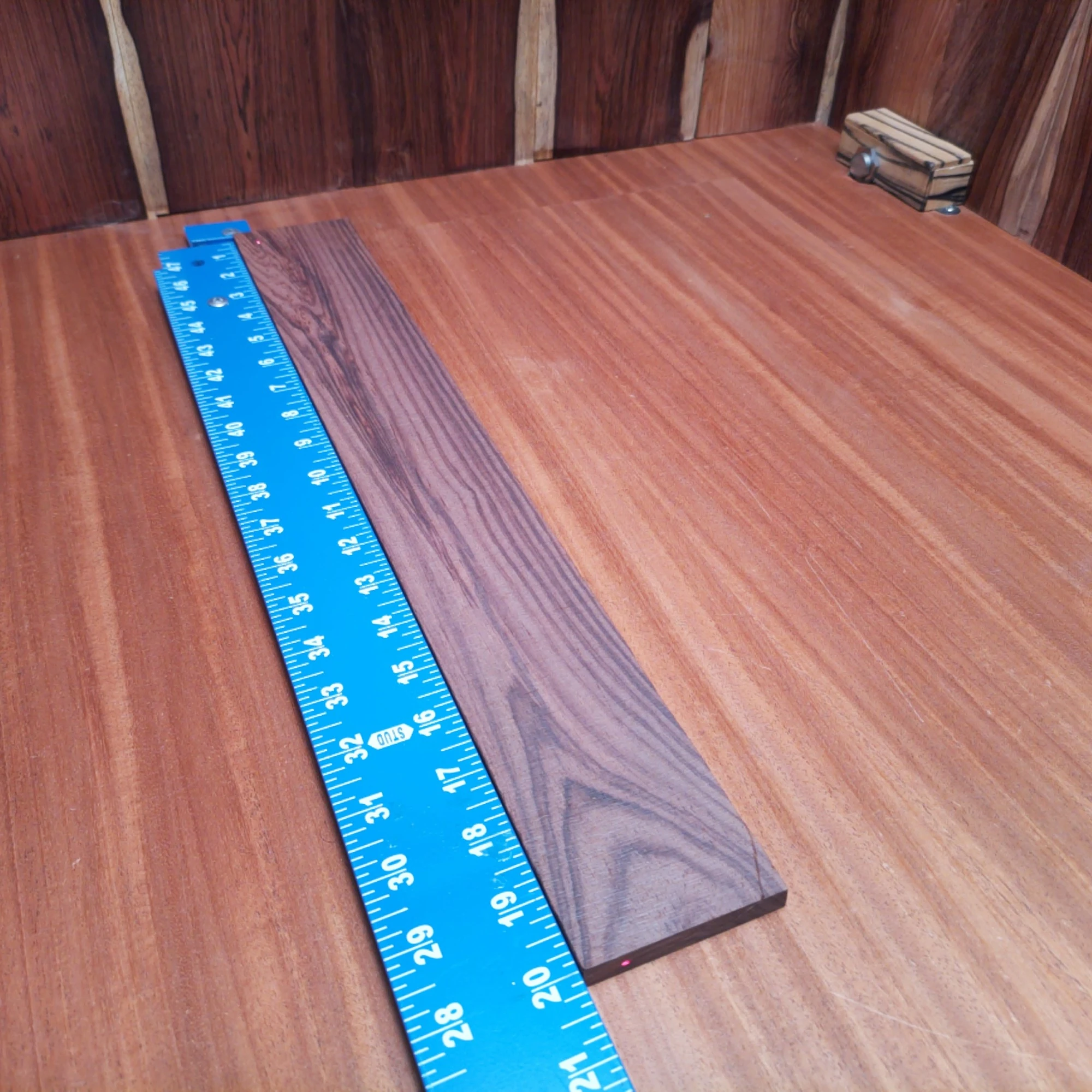 Amazon Rosewood Acoustic Rift Sawn Fingerboard Blank 0.4" X 2.7" X 20.0" - ARAFBR000683 1 Elevate your acoustic creations with this premium Amazon Rosewood blank. Its rift-sawn structure promises not only incredible tonal quality but also exceptional durability. Perfect for luthiers, this versatile blank allows artisans to craft beautiful and resonant instruments. Get ready to make music that stands out in both sound and style! It is a Amazon Rosewood Acoustic Rift Sawn fingerboard blank with dimensions of 20.0 x 2.7 x 0.4 inches.