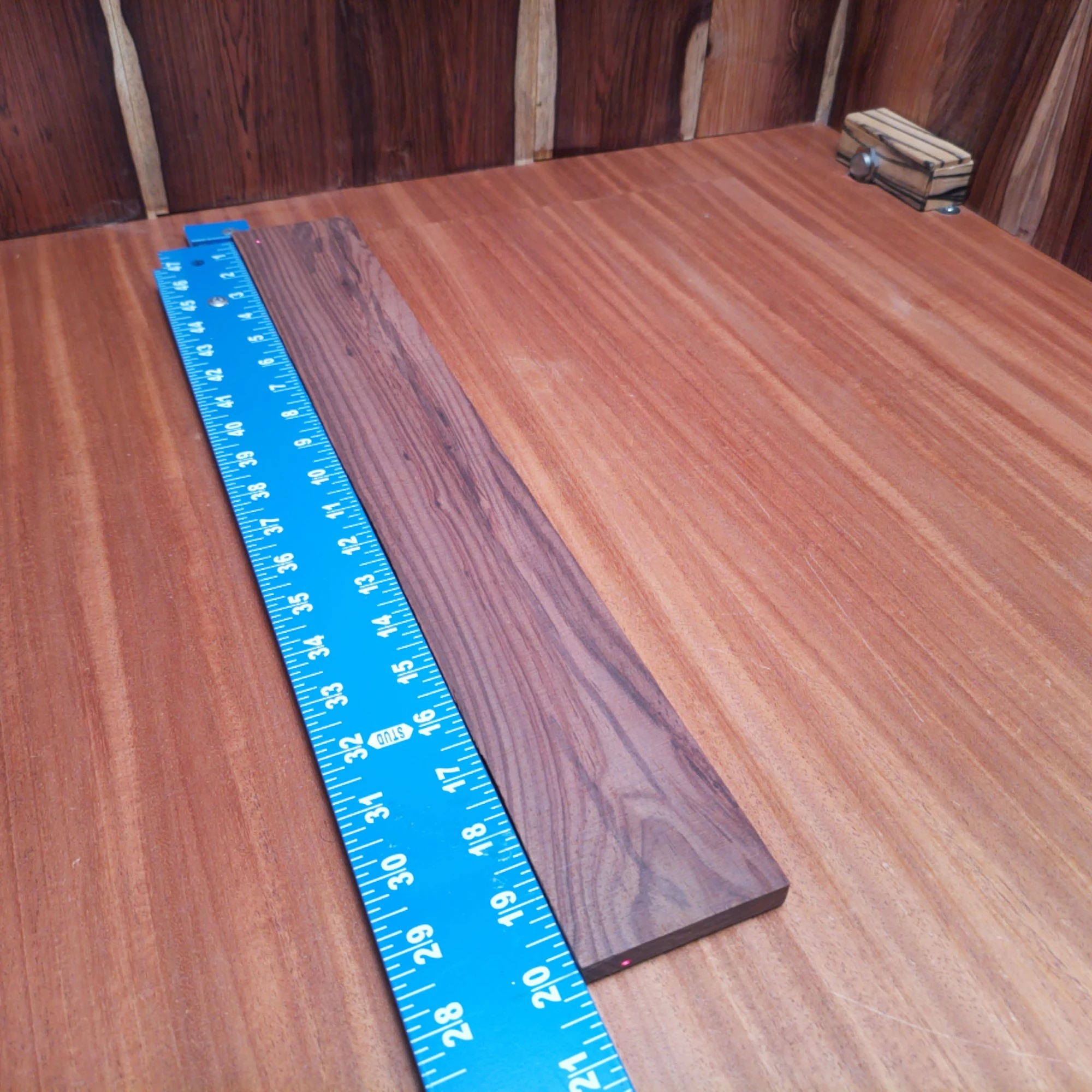Amazon Rosewood Acoustic Rift Sawn Fingerboard Blank 0.4" X 2.7" X 20.0" - ARAFBR000683 2 Elevate your acoustic creations with this premium Amazon Rosewood blank. Its rift-sawn structure promises not only incredible tonal quality but also exceptional durability. Perfect for luthiers, this versatile blank allows artisans to craft beautiful and resonant instruments. Get ready to make music that stands out in both sound and style! It is a Amazon Rosewood Acoustic Rift Sawn fingerboard blank with dimensions of 20.0 x 2.7 x 0.4 inches.