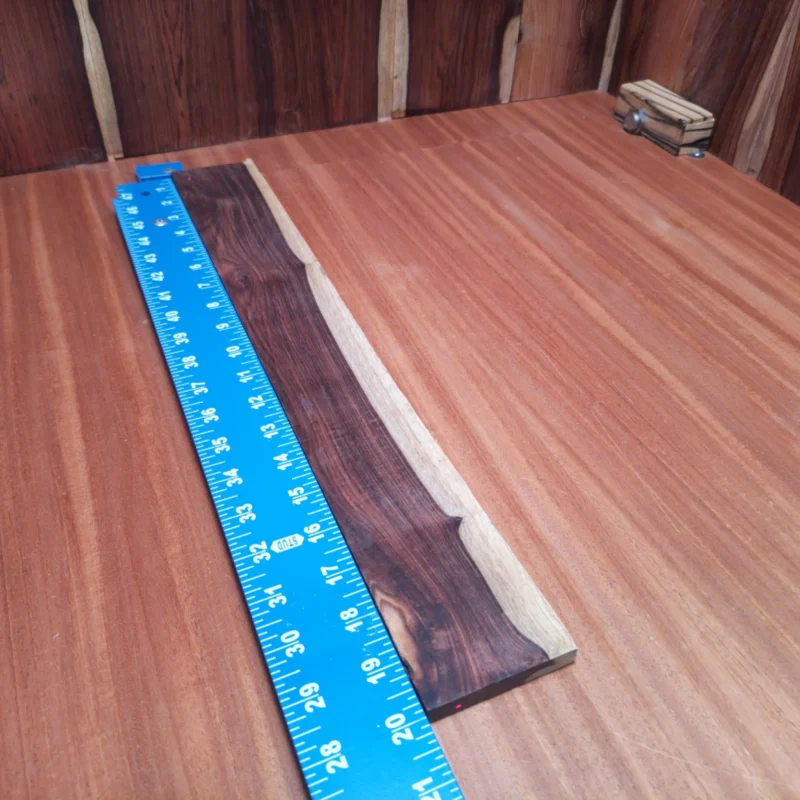 Crafted from premium Amazon rosewood, this fingerboard blank is perfect for building stunning acoustic instruments. Its rift-sawn grain offers both beauty and durability, making it an ideal choice for luthiers looking to enhance their craftsmanship. Enjoy the smooth finish and rich tonal qualities that this fingerboard blank provides, elevating your instruments to new heights. Experience the difference with this reliable and versatile wood option. It is a Amazon Rosewood Acoustic Rift Sawn fingerboard blank with dimensions of 19.9 x 2.6 x 0.4 inches.