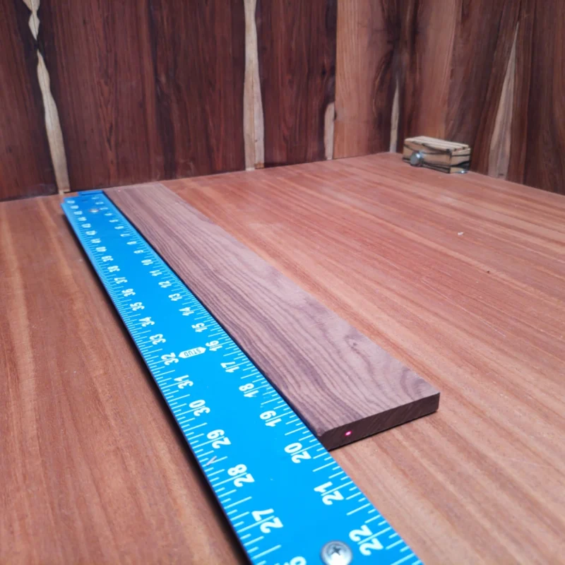 Unlock your tonal potential with this finely crafted fingerboard blank. Made from premium Amazon Rosewood, this rift-sawn piece boasts a rich grain pattern and exceptional durability, perfect for luthiers looking to create instruments with outstanding resonance and playability. Whether you're rebuilding or starting fresh, this fingerboard blank will elevate your craftsmanship and impress any musician. It is a Amazon Rosewood Acoustic Rift Sawn fingerboard blank with dimensions of 19.8 x 2.7 x 0.4 inches.