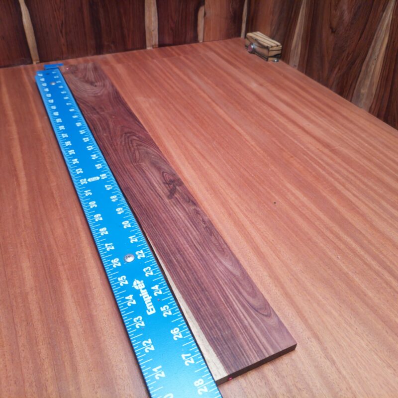 Transform your piece of Amazon Rosewood into a handcrafted knife handle or a stunning decorative wall art. Whether you craft a unique guitar inlay or stylish phone stand, each creation will whisper luxury. So grab that wood and make everything from coasters to jewelry boxes, and impress your friends with your elevated woodworking skills (or just your good taste!). This piece of Amazon Rosewood measures 0.4 inches by 3.1 inches by 27.9 inches, offering a high-quality option for a variety of woodworking projects.