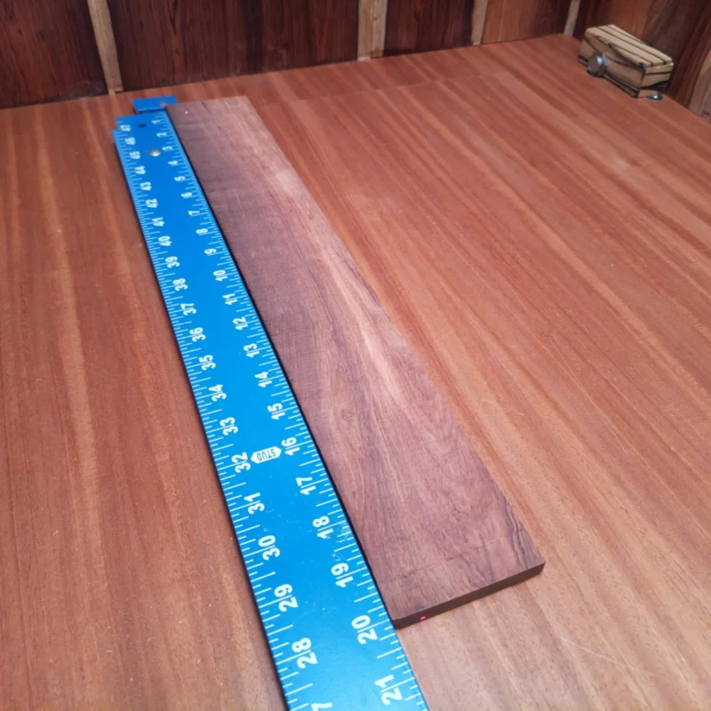Brazilian Rosewood Acoustic Rift Sawn Fingerboard Blank 0.3" X 2.9" X 20.0" - BRAFBR000156 3 Discover the beauty and versatility of this Brazilian Rosewood fingerboard blank. Perfectly crafted for luthiers, it features a rich grain that promises stunning aesthetics and excellent tonal quality. This premium wood is ideal for creating acoustic masterpieces, ensuring that every note resonates beautifully. Whether you're a seasoned professional or just starting, this fingerboard blank will elevate your instrument craftsmanship to new heights! It is a Brazilian Rosewood Acoustic Rift Sawn fingerboard blank with dimensions of 20.0 x 2.9 x 0.3 inches.