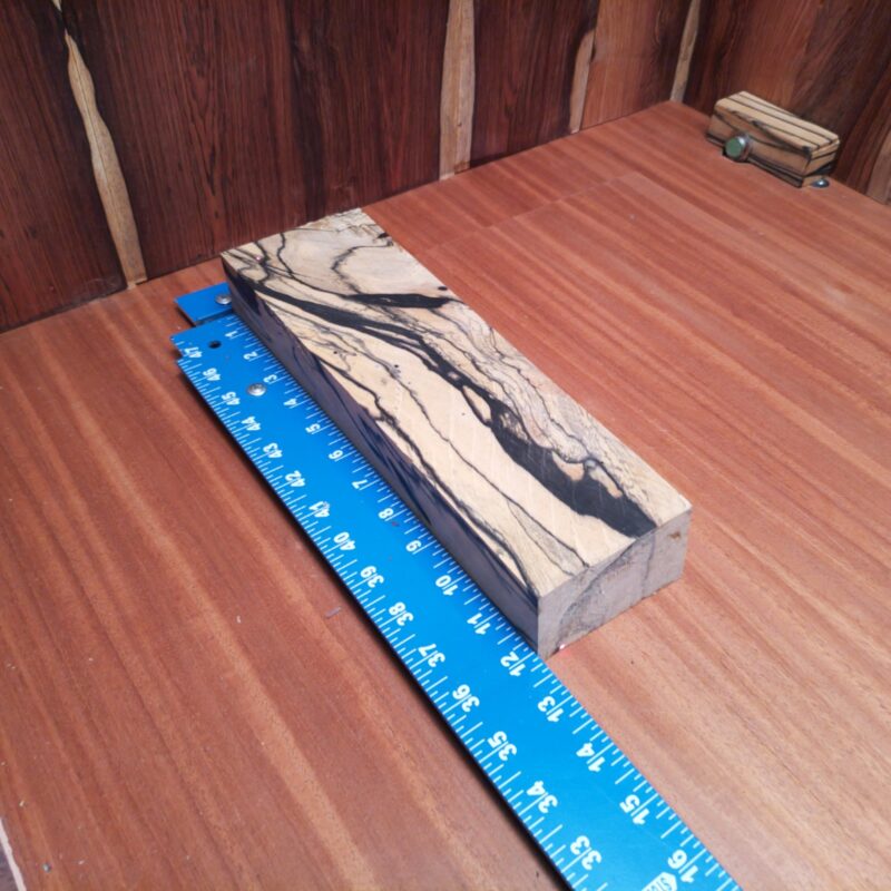 Black and White Ebony 2.0" X 3.5" X 11.7" Wood Blank for Woodworking Projects - BWDL001142 6 With Black and White Ebony, you can create everything from high-end drawer pulls to luxurious knife handles. Who knew wood could be so versatile? Add a touch of bespoke style to your life with unique coat hooks or chic picture frames that steal the show. Let your imagination run wild with exquisite serving boards and artistic bowl bases! This piece of Black and White Ebony measures 2.0 inches by 3.5 inches by 11.7 inches, offering a high-quality option for a variety of woodworking projects.