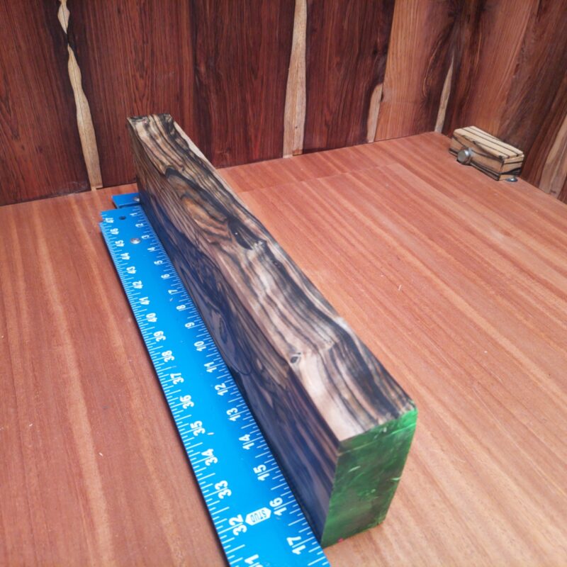 This Black and White Ebony G1 is perfect for crafting your knife handles or those fancy pens you keep dropping! Need that wow-factor for your business cards? Custom drawer pulls can save the day. Plus, don’t forget about those elegant coasters that'll keep your table unscathed! It’s not just wood, it’s a conversation starter! This piece of Black and White Ebony measures 1.6 inches by 4.2 inches by 17.3 inches, offering a high-quality option for a variety of woodworking projects.