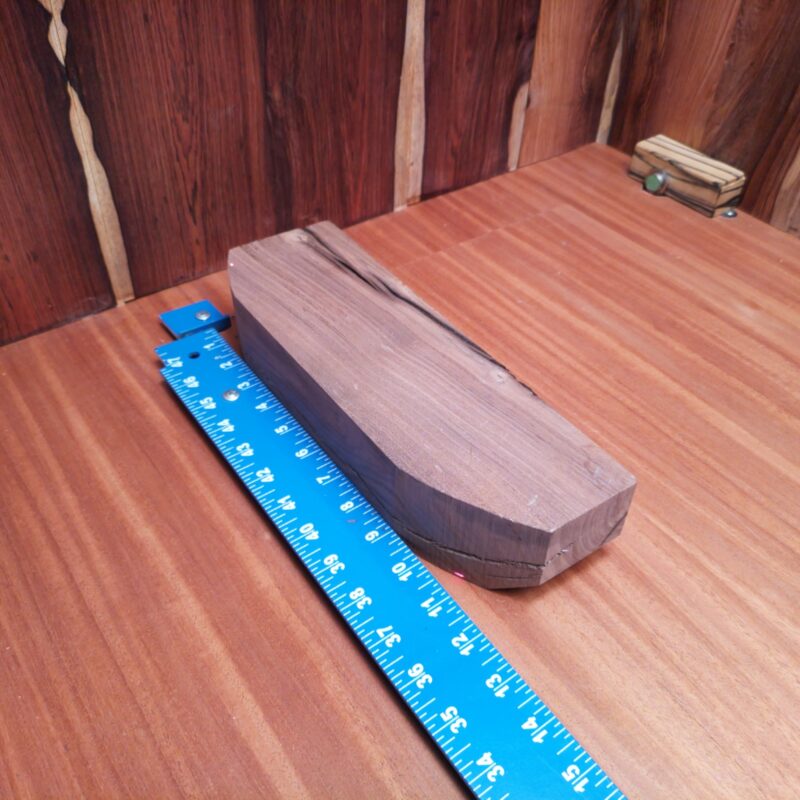 Prepare yourself for a world of wood! This Claro Walnut can transform into elegant picture frames or bespoke hairpin legs. Want high-end drawer pulls or a unique wine cork holder? Look no further! These rich, luxurious designs will have your guests thinking you hired a professional artisan – or at least a very crafty friend! This piece of Claro Walnut measures 2.4 inches by 3.5 inches by 11.8 inches, offering a high-quality option for a variety of woodworking projects.
