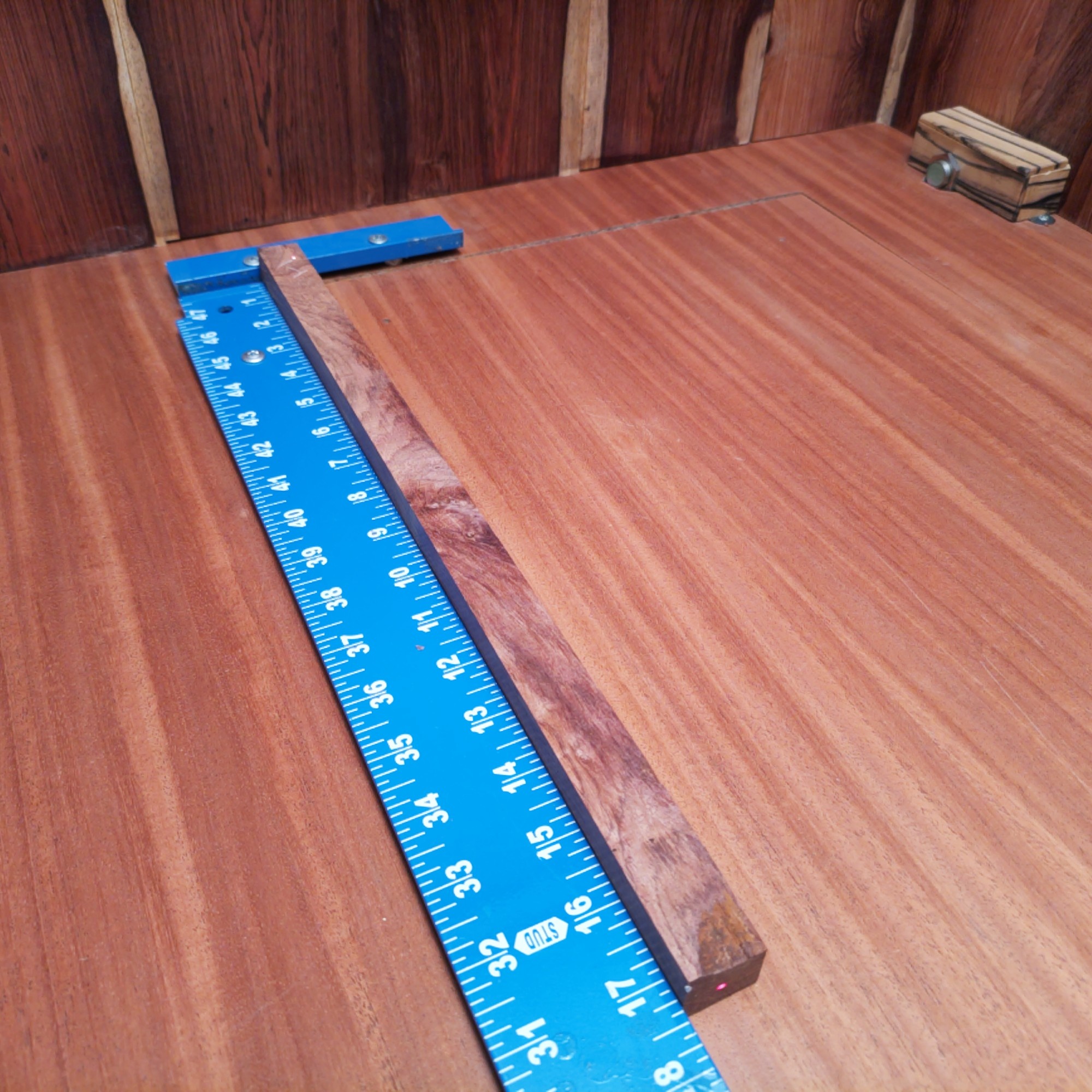 Honduran Rosewood Burl 1.0" X 0.9" X 17.2" Wood Blank for Woodworking Projects - HBDL001077 3 Get ready to be amazed by the versatility of Honduran Rosewood Burl! With just a piece measuring 1.0" x 0.9" x 17.2", you can create stunning items like high-end jewelry boxes and unique guitar necks. This wood can transform into decorative coasters and artisan wine corks that will leave your guests talking long after the party ends. Who knew such a small piece could make such a big impression? This piece of Honduran Rosewood Burl measures 1.0 inches by 0.9 inches by 17.2 inches, offering a high-quality option for a variety of woodworking projects.