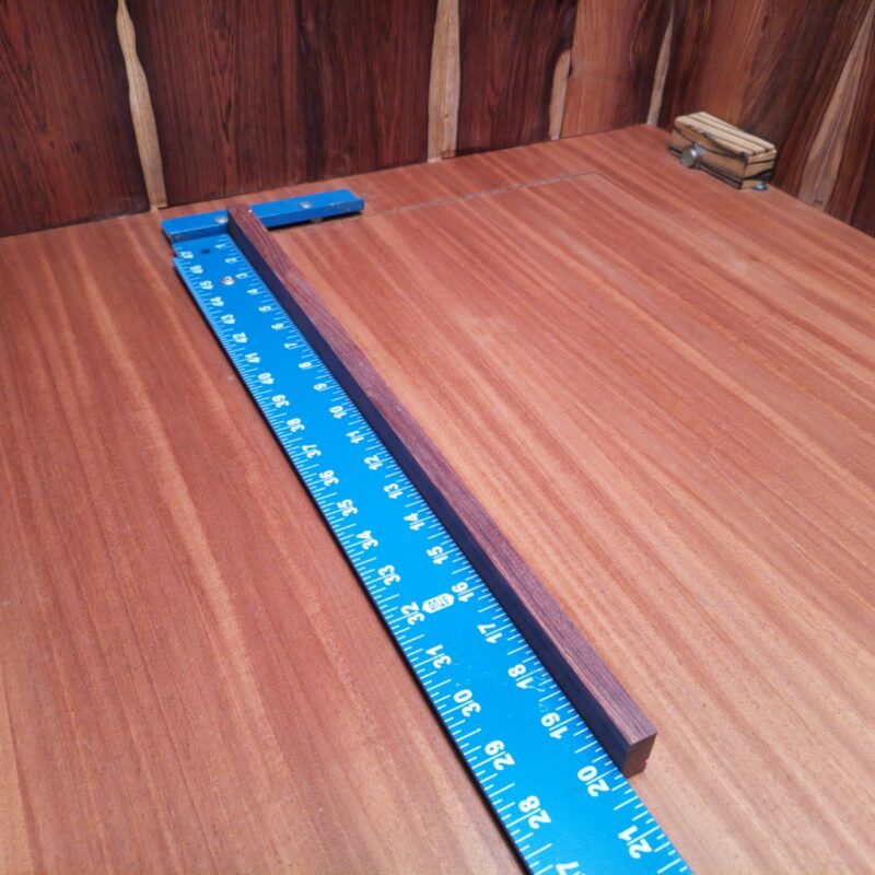 Honduran Rosewood 0.5" X 1.0" X 20.1" Wood Blank for Woodworking Projects - HRDL001098 5 With a touch of nature's elegance, this Honduran Rosewood Burl transforms into custom knife handles and decorative table inlays. Whether enhancing your guitar neck or serving up a luxurious charcuterie board, this wood is as versatile as your creativity. Fun fact: this fiber-rich gem also makes excellent high-end gift cards, because who doesn’t want to pamper their pals with a handmade wooden touch? This piece of Honduran Rosewood Burl measures 0.5 inches by 1.0 inches by 20.1 inches, offering a high-quality option for a variety of woodworking projects.