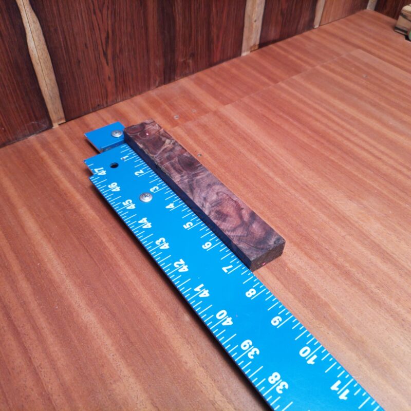 Honduran Rosewood Burl 0.7" X 1.2" X 7.2" Wood Blank for Woodworking Projects - HBDL001120 6 With a piece of Honduran Rosewood Burl, you can create a charming array of custom drawer pulls, elegant coasters set, or even a luxury guitar pick! This wood has the personality to turn ordinary items into extraordinary masterpieces, from personalized keychains to unique decorative inlays. Let your creativity flow as you craft trinkets that tickle your fancy and those of your friends! This piece of Honduran Rosewood Burl measures 0.7 inches by 1.2 inches by 7.2 inches, offering a high-quality option for a variety of woodworking projects.