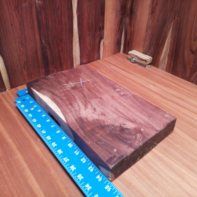 Honduran Rosewood Burl 1.6" X 8.5" X 14.7" Wood Blank for Woodworking Projects - HBDL001139 6 Crafting with Honduran Rosewood Burl opens the door to endless creative possibilities! Imagine an elegant desk organizer or a unique candle holder that's sure to light up the room. We’re talking about a luxe charcuterie board that can double as a table centerpiece, or bespoke drawer pulls that steal the show in any room. Why not boost your space with some artful bookends too? Transform your wood into grandeur with effortless style! This piece of Honduran Rosewood Burl measures 1.6 inches by 8.5 inches by 14.7 inches, offering a high-quality option for a variety of woodworking projects.
