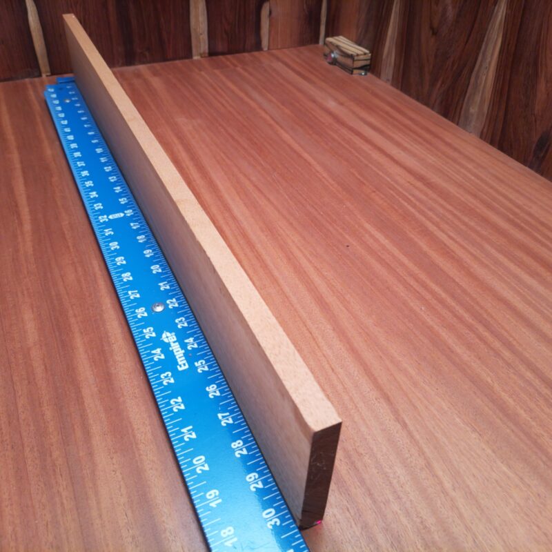 Honduran Mahogany 0.6" X 4.0" X 30.4" Wood Blank for Woodworking Projects - HMDL001208 7 Looking for inspiration on how to use Honduran Mahogany? Consider turning it into a luxurious picture frame, unique business card holder, or a stylish shelf bracket. This stunning wood can transform into a bespoke jewelry box top or a wood-turned napkin ring, giving your home a high-end feel without breaking the bank! Build your decor with elegance, but don’t forget the bottle of wine in that new rack! This piece of Honduran Mahogany measures 0.6 inches by 4.0 inches by 30.4 inches, offering a high-quality option for a variety of woodworking projects.