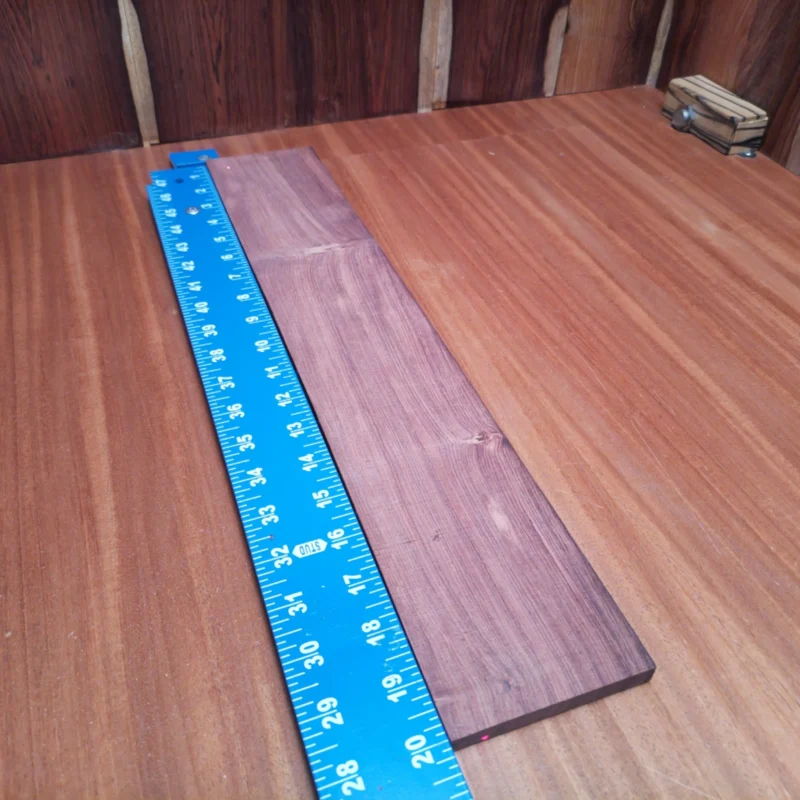 Honduran Rosewood Acoustic Quarter Sawn Fingerboard Blank 0.4" X 3.5" X 20.1" - HRAFBQ000653 3 Elevate your next acoustic creation with this premium Honduran Rosewood blank. Ideal for luthiers, this quarter-sawn wood features impressive tonal quality and stability. Its straight grain ensures effortless playability, making it a top choice for professional instruments. Whether crafting a striking guitar or a unique custom piece, this blank provides the perfect foundation for your artistic visions. Get ready to produce some trending sounds with this versatile wood! It is a Honduran Rosewood Acoustic Quarter Sawn fingerboard blank with dimensions of 20.1 x 3.5 x 0.4 inches.