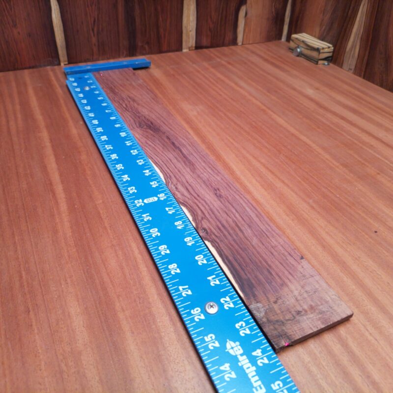 Unleash your creativity with this Honduran Rosewood fingerboard blank. Its rich grain provides a striking backdrop for any acoustic instrument, making each piece unique. Perfect for luthiers looking to enhance their builds, this rift sawn blank ensures stability while delivering vibrant tonal quality. Upgrade your projects with the engagement and warmth that only rosewood can offer! It is a Honduran Rosewood Acoustic Rift Sawn fingerboard blank with dimensions of 24.0 x 3.0 x 0.3 inches.