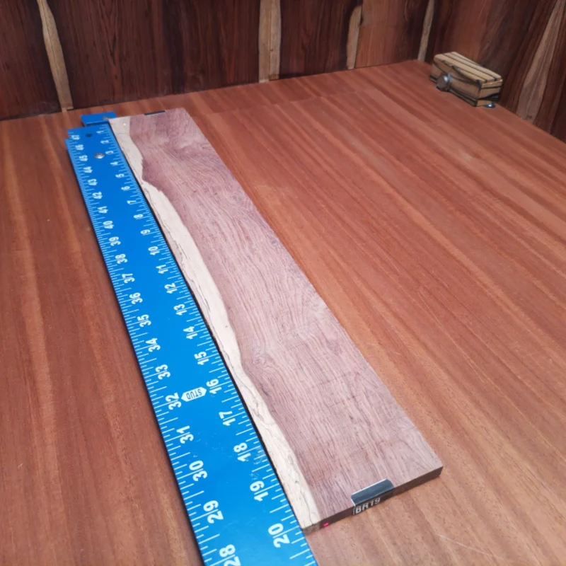Crafted from high-quality Honduran Rosewood, this acoustic fingerboard blank is perfect for your next project. Its exceptional rift-sawn grain provides both beauty and stability, making it a fantastic choice for luthiers. With dimensions of 0.4