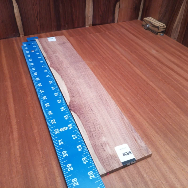 Honduran Rosewood Acoustic Rift Sawn Fingerboard Blank 0.4" X 4.0" X 20.3" - HRAFBR000039 3 Discover the beauty and versatility of this Honduran Rosewood blank, perfect for crafting acoustics. The rich, deep tones and stunning grain patterns will enhance any luthier's project, providing a vibrant sound while ensuring durability. Get ready to elevate your guitar-making game with this high-quality wood that resonates with musicians seeking both quality and beauty in their instruments. It is a Honduran Rosewood Acoustic Rift Sawn fingerboard blank with dimensions of 20.3 x 4.0 x 0.4 inches.