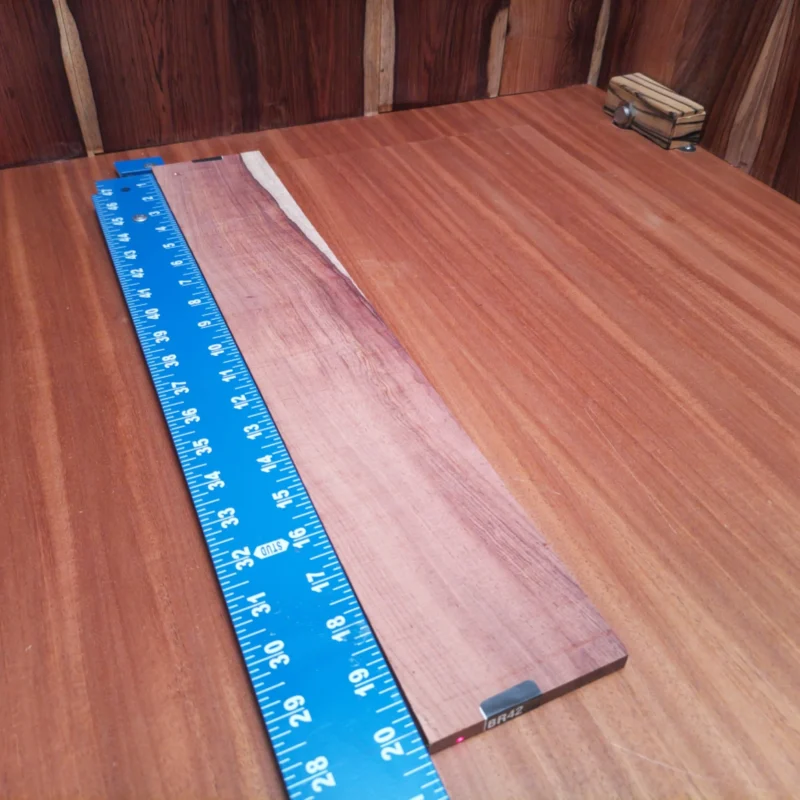 Honduran Rosewood Acoustic Rift Sawn Fingerboard Blank 0.4" X 3.6" X 20.3" - HRAFBR000042 3 Unleash your creativity with this Honduran Rosewood fingerboard blank. Ideal for luthiers, it boasts a beautiful grain pattern that will elevate any acoustic guitar project. This rich and durable wood not only looks stunning but also offers great tonal qualities. Perfect for crafting a unique sound, this fingerboard blank will make your instruments truly stand out in style and performance. It is a Honduran Rosewood Acoustic Rift Sawn fingerboard blank with dimensions of 20.3 x 3.6 x 0.4 inches.
