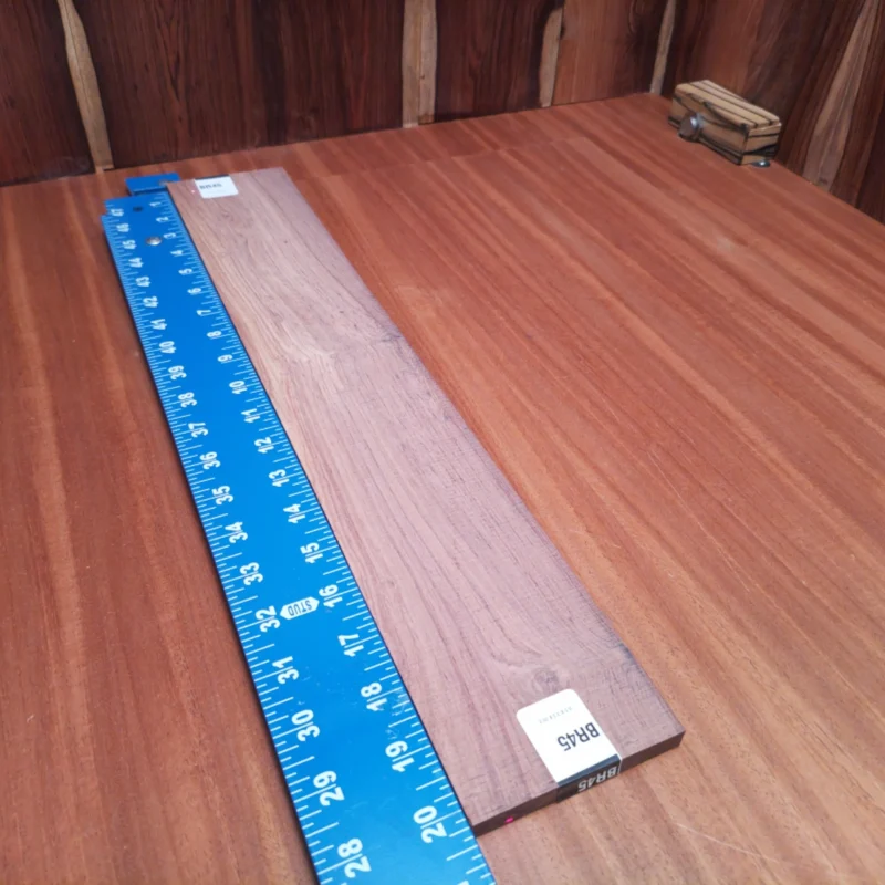 Honduran Rosewood Acoustic Rift Sawn Fingerboard Blank 0.4" X 3.4" X 20.3" - HRAFBR000045 3 Elevate your string instruments with our Honduran Rosewood blank, perfectly cut for crafting guitars and acoustics. This beautiful, dense wood offers a warm tone and excellent projection, making it a go-to choice for luthiers. Its striking grain pattern promises to enhance both the aesthetic and sound of your instrument. Ideal for serious builders looking for quality and durability! It is a Honduran Rosewood Acoustic Rift Sawn fingerboard blank with dimensions of 20.3 x 3.4 x 0.4 inches.