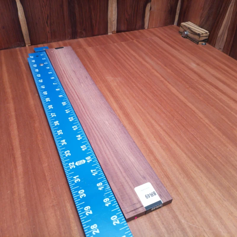 Honduran Rosewood Acoustic Rift Sawn Fingerboard Blank 0.4" X 2.7" X 20.3" - HRAFBR000049 3 Explore the beauty and depth of sound with this Honduran Rosewood fingerboards blank. Perfect for luthiers looking to create stunning acoustic masterpieces, its rift-sawn grain ensures a beautiful finish while providing excellent tonal qualities. Ideal for both acoustic and electric guitars, this blank delivers durability and elegance in one piece. Unlock your creativity with this versatile and high-quality wood that enhances playability and aesthetic appeal, making every note resonate beautifully. It is a Honduran Rosewood Acoustic Rift Sawn fingerboard blank with dimensions of 20.3 x 2.7 x 0.4 inches.