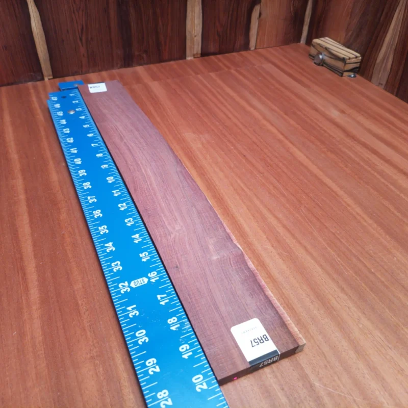 Fingerboard Blanks 90 Craft your masterpiece with this Honduran Rosewood blank, perfect for luthiers seeking rich tonal quality. Its refined rift-sawn grain enhances both aesthetics and sound, resulting in a premium build for your acoustic instrument. Ideal for creating resonant back and sides or luxurious fingerboards, this wood strikes the perfect balance between structure and beauty. Elevate your craftsmanship and inspire your next project with this stunning rosewood! It is a Honduran Rosewood Acoustic Rift Sawn fingerboard blank with dimensions of 20.2 x 2.6 x 0.4 inches.