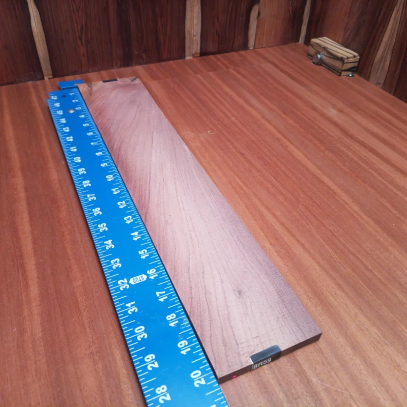 Crafted from premium Honduran Rosewood, this acoustic fingerboard blank delivers outstanding tonal richness. With a balanced blend of warm overtones and bright clarity, it's perfect for luthiers seeking quality wood. Its ergonomic dimensions make it ideal for creating beautifully playable instruments, while the unique grain patterns add character. Upgrade your builds with a blank that transforms sound and style into your masterpiece. It is a Honduran Rosewood Acoustic Rift Sawn fingerboard blank with dimensions of 20.3 x 3.8 x 0.4 inches.