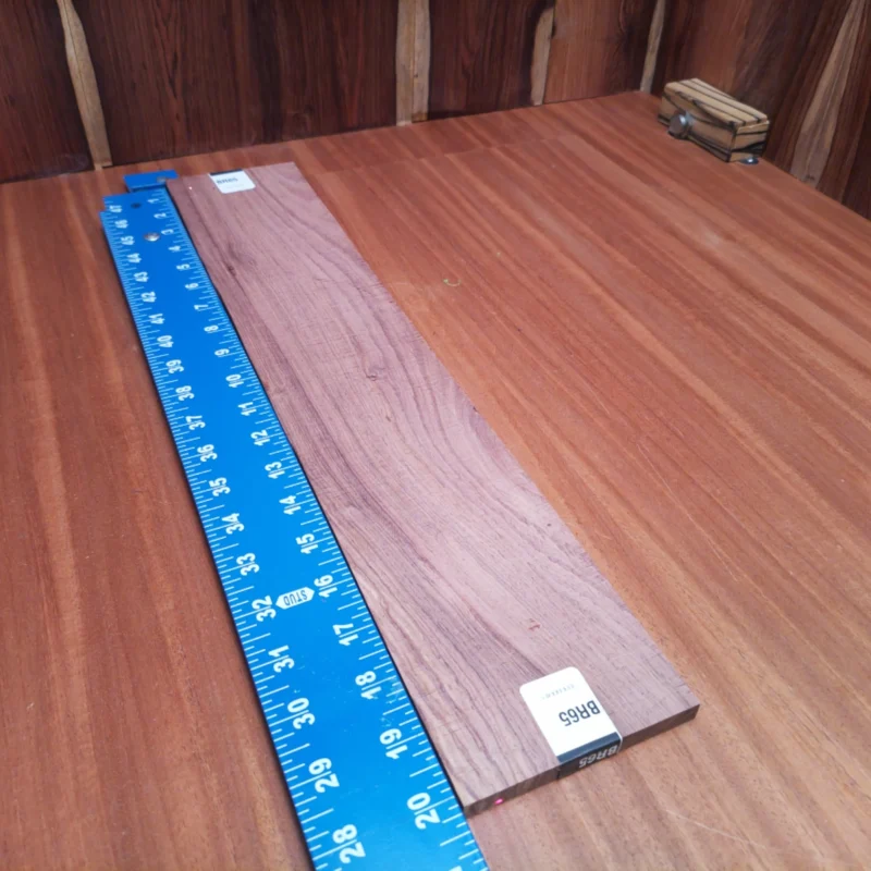 Elevate your luthier craft with this stunning Honduran Rosewood blank. Perfect for acoustic guitar backs or sides, its rich tonal qualities and striking grain ensure that every note resonates beautifully. This versatile wood is not just a pretty face; it also offers excellent durability under pressure. Experience the blend of beauty and functionality with this fingerboard blank that luthiers will love to work with! It is a Honduran Rosewood Acoustic Rift Sawn fingerboard blank with dimensions of 20.3 x 3.9 x 0.4 inches.