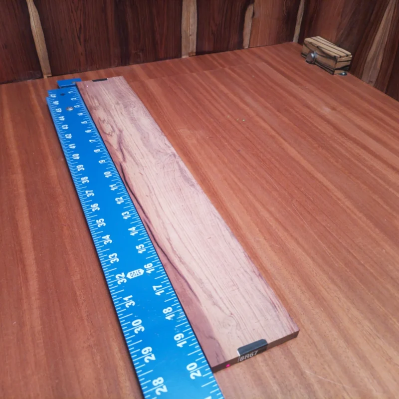 Elevate your instrument-making game with our Honduran Rosewood fingerboard blank. This premium rift-sawn piece is perfect for crafting custom acoustic guitars, delivering rich sound and stunning aesthetics. The fine straight grain and dense structure ensure durability and longevity, while its vibrant color enhances any luthier's project. Whether you’re a seasoned pro or a passionate hobbyist, this fingerboard blank will inspire creativity in every strum and pluck. It is a Honduran Rosewood Acoustic Rift Sawn fingerboard blank with dimensions of 20.3 x 3.1 x 0.5 inches.