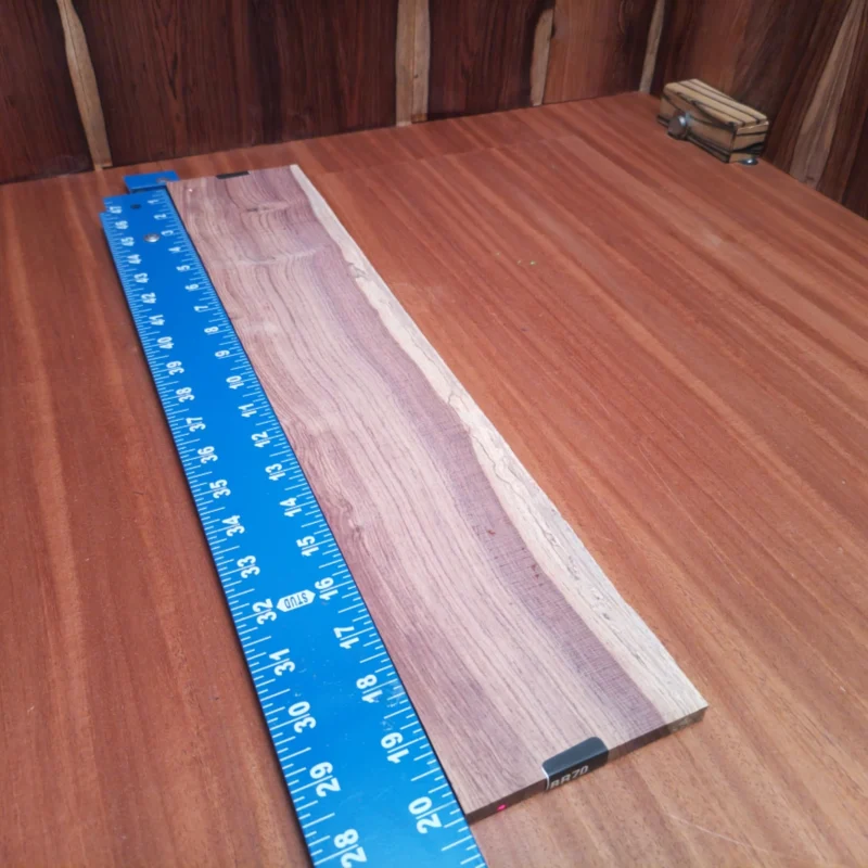 Crafted from premium Honduran Rosewood, this fingerboard blank is perfect for luthiers seeking tonal richness and aesthetic appeal. Measuring 0.4