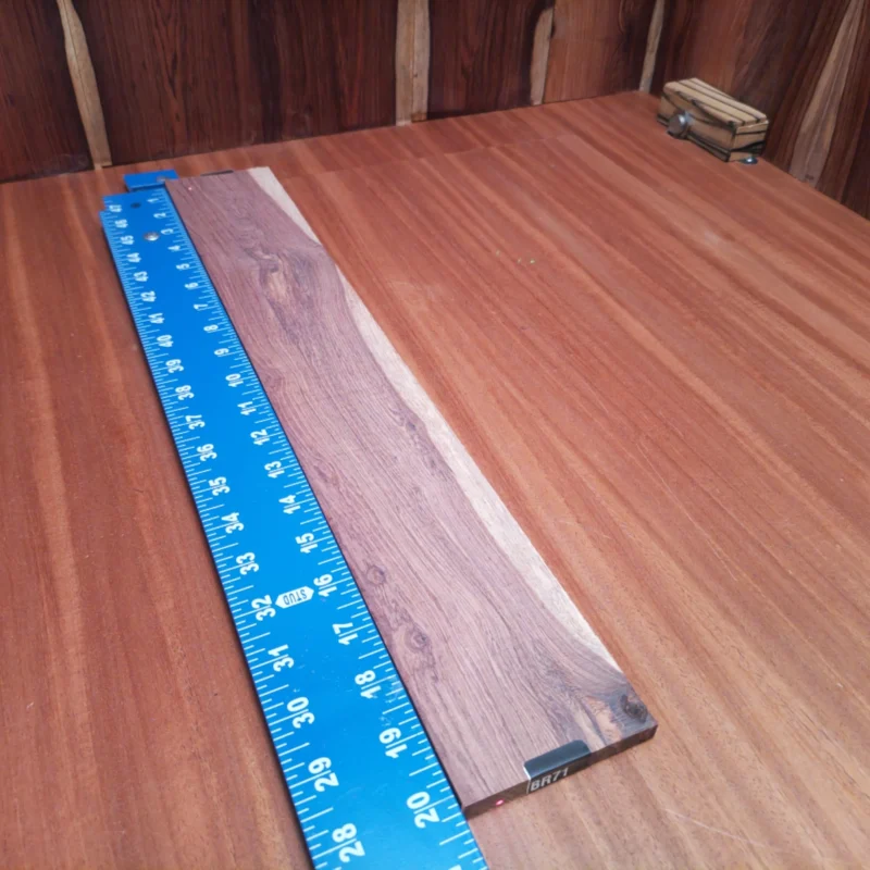 This Honduran Rosewood blank is perfect for luthiers looking to craft stunning acoustics. Its rich grain and resonance provide incredible tonal depth while being easy to work with. Ideal for crafting fingerboards, this durable wood will elevate your instrument's playability and aesthetics. Don't miss the chance to enhance your creations with this beautiful, high-quality blank! It is a Honduran Rosewood Acoustic Rift Sawn fingerboard blank with dimensions of 20.3 x 3.1 x 0.3 inches.