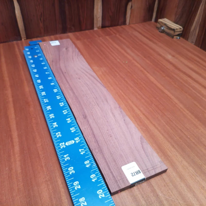 Honduran Rosewood Acoustic Rift Sawn Fingerboard Blank 0.4" X 3.9" X 20.2" - HRAFBR000072 3 Transform your instrument-building with this premium Honduran Rosewood blank. This stunning acoustic wood offers excellent tonal qualities, making it ideal for luthiers seeking warmth and resonance. Its rift-sawn design enhances stability and visual appeal, allowing you to craft exquisite guitars that deliver unforgettable sound. Elevate your next project with this quality fingerboard blank that seamlessly blends craftsmanship with natural beauty. It is a Honduran Rosewood Acoustic Rift Sawn fingerboard blank with dimensions of 20.2 x 3.9 x 0.4 inches.
