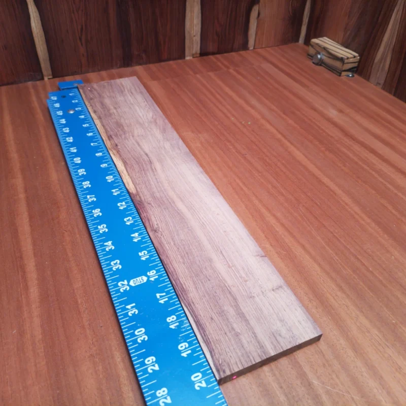 Unlock the full potential of your acoustic instruments with this premium Honduran Rosewood fingerboards blank. Renowned for its rich tonal qualities and stunning appearance, this rift sawn piece is perfect for luthiers looking to elevate their craft. Ideal for creating vibrant soundscapes, this blank offers excellent workability and durability, ensuring exceptional playability for years to come. Embrace the beauty of nature while crafting your next masterpiece! It is a Honduran Rosewood Acoustic Rift Sawn fingerboard blank with dimensions of 20.2 x 3.8 x 0.4 inches.