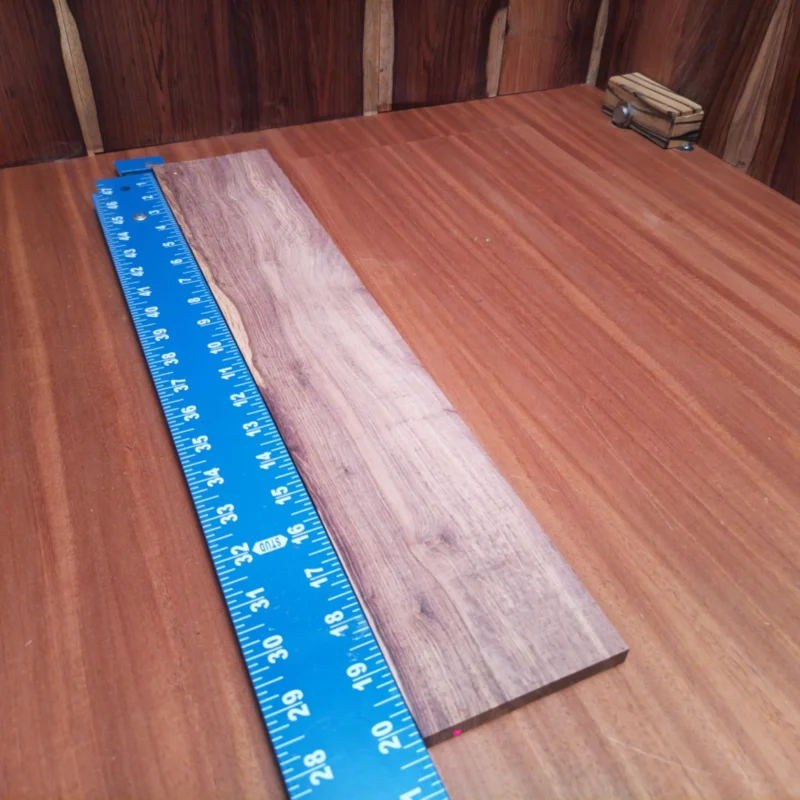 Discover the beauty of Honduran Rosewood in this acoustic fingerboard blank. Perfectly crafted for luthiers, it offers outstanding tonal properties and aesthetic appeal. The rich, warm tones and striking grain patterns make it an ideal choice for high-quality instruments. Elevate your craft and enhance your builds with this durable, versatile fingerboard blank that promises both sustainability and performance. Your next guitar project deserves a touch of elegance. It is a Honduran Rosewood Acoustic Rift Sawn fingerboard blank with dimensions of 20.4 x 3.8 x 0.4 inches.