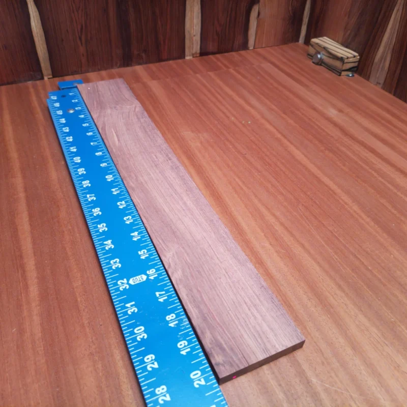 Upgrade your crafting game with this Honduran Rosewood blank, perfect for luthiers. With its rich tones and stability, it ensures both beauty and durability in your acoustic instruments. The rift-sawn cut enhances tonal clarity, making it an ideal choice for high-quality builds. Whether you're a hobbyist or a pro, this blank offers the perfect foundation for your next guitar masterpiece. It is a Honduran Rosewood Acoustic Rift Sawn fingerboard blank with dimensions of 20.3 x 2.9 x 0.4 inches.