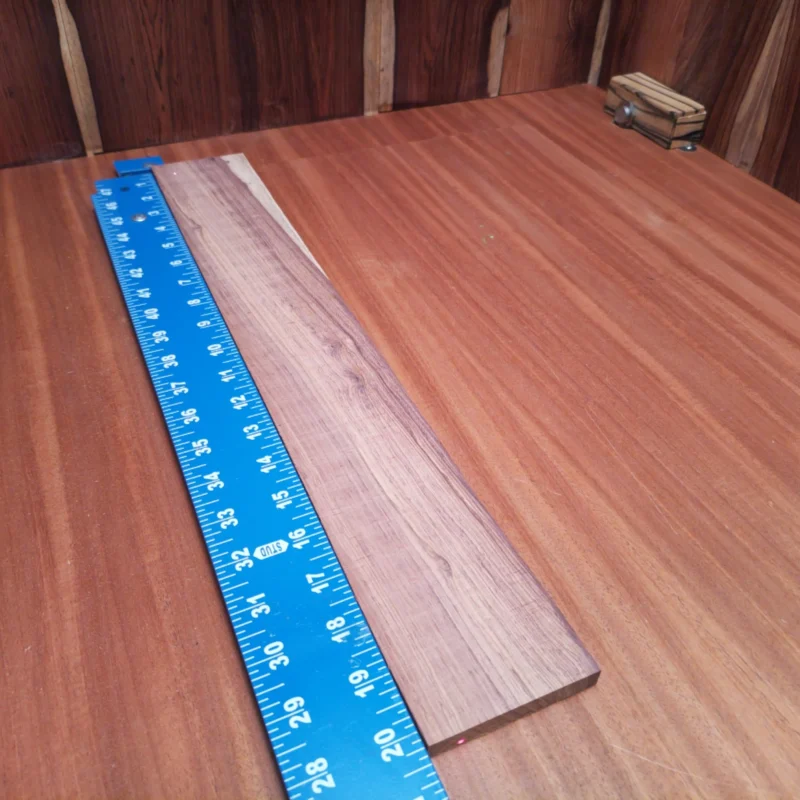Crafted from dark Honduran Rosewood, this acoustic fingerboard blank is a luthier's dream. Its rich tones and vibrant grain patterns promise exceptional resonance and stunning visual aesthetics. Ideal for guitars, this blank offers durability and stability, making your craft easier while creating beautiful instruments. Whether you’re a hobbyist or a seasoned pro, elevate your acoustic builds with this premium quality fingerboard blank. It is a Honduran Rosewood Acoustic Rift Sawn fingerboard blank with dimensions of 20.3 x 2.9 x 0.4 inches.