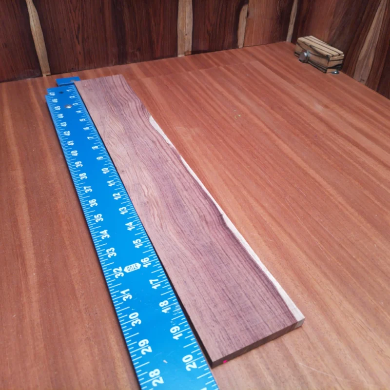 Unlock your creativity with this Honduran Rosewood fingerboards blank, offering a perfect canvas for luthiers. Its beautiful grain and rich color enhance any acoustic project, while the sturdy dimensions make it ideal for crafting exceptional musical instruments. Elevate your craftsmanship with this sustainably sourced wood, known for its tonal richness and stunning aesthetic that will surely impress musicians and builders alike. It is a Honduran Rosewood Acoustic Rift Sawn fingerboard blank with dimensions of 20.3 x 3.1 x 0.4 inches.
