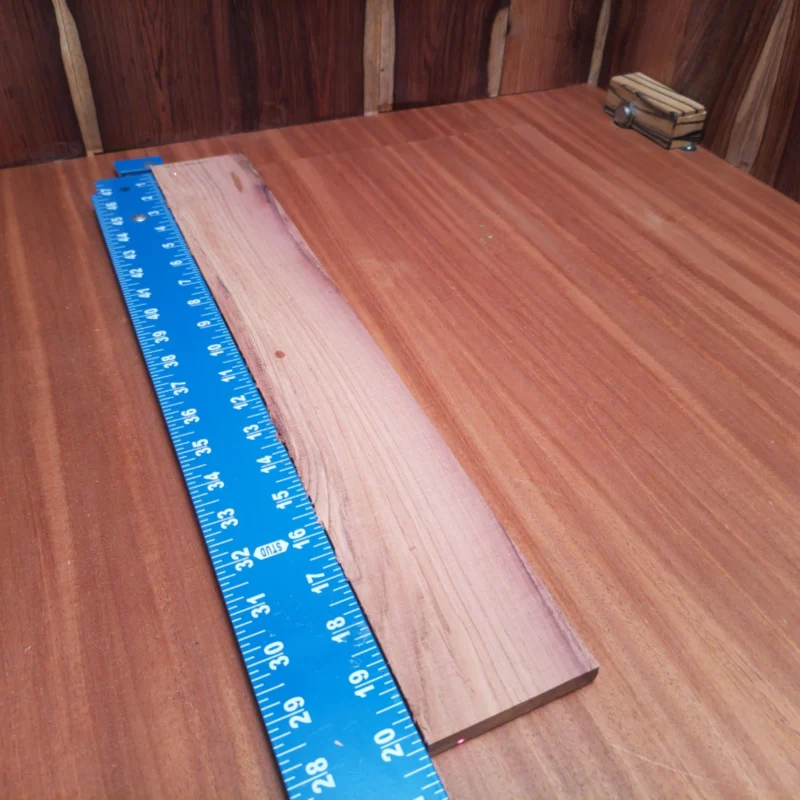 Honduran Rosewood Acoustic Rift Sawn Fingerboard Blank 0.4" X 2.9" X 20.3" - HRAFBR000086 3 Crafted from premium Honduran Rosewood, this acoustic fingerboard blank promises a stunning aesthetic and rich tonal qualities ideal for luthiers. With its precise dimensions, this top-quality wood will enhance your instrument's playability and resonate with warmth. Elevate your guitar projects with a piece that fuses beauty and functionality while providing an exceptional canvas for your craft. It is a Honduran Rosewood Acoustic Rift Sawn fingerboard blank with dimensions of 20.3 x 2.9 x 0.4 inches.