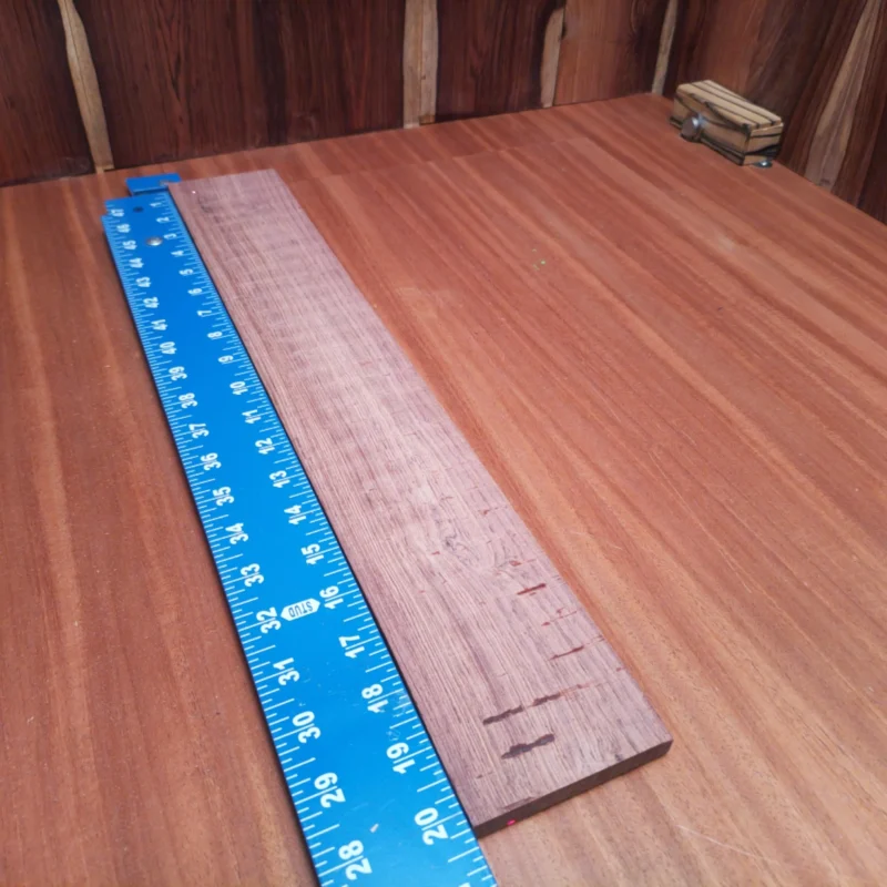 Honduran Rosewood Acoustic Rift Sawn Fingerboard Blank 0.4" X 3.1" X 20.3" - HRAFBR000087 3 Elevate your luthiery game with this stunning Honduran Rosewood blank. With its rich tonal qualities and beautiful grain patterns, this wood is perfect for crafting acoustic instruments that resonate beautifully and please the eye. Measuring 0.4