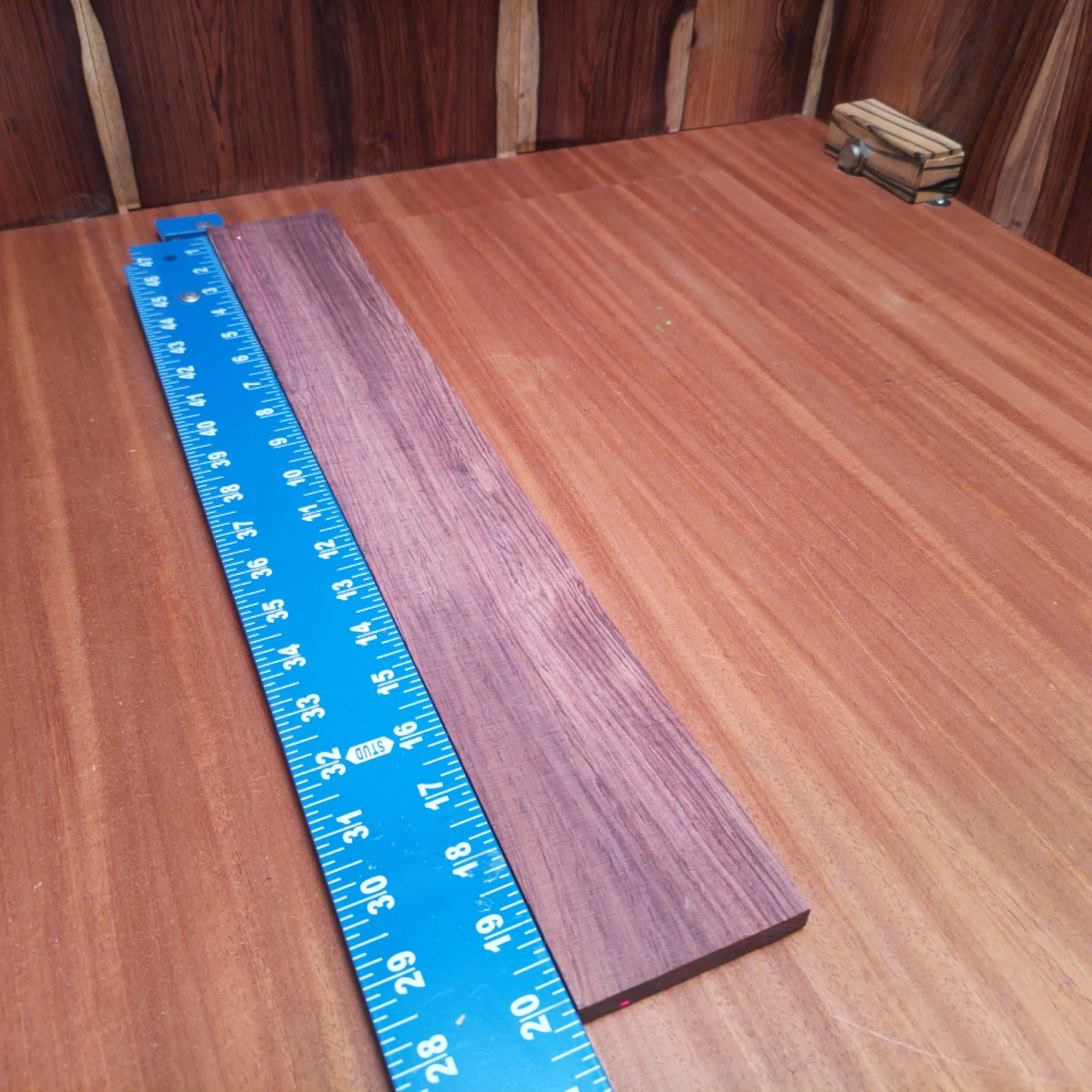 Honduran Rosewood Acoustic Rift Sawn Fingerboard Blank 0.4" X 2.9" X 20.3" - HRAFBR000088 2 Elevate your instrument-building game with this Honduran Rosewood blank. Perfect for luthiers, its rift-sawn design ensures superb tonal quality and stability. Use this beautiful, dense hardwood to craft acoustic guitars or other string instruments that sound as good as they look. Bring your craftsmanship to life with the rich, warm tones of this stunning wood that your customers will love! It is a Honduran Rosewood Acoustic Rift Sawn fingerboard blank with dimensions of 20.3 x 2.9 x 0.4 inches.