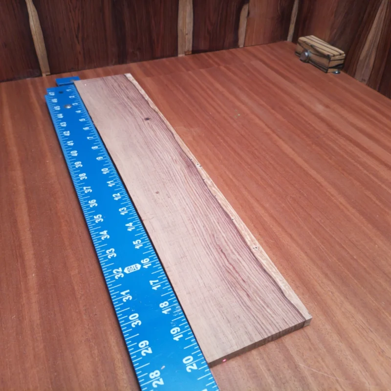 Get ready to elevate your luthier craft with this Honduran Rosewood fingerboards blank. Perfectly rift sawn and dimensioned to provide excellent tonal quality and superior playability, this premium blank ensures a luxurious touch and beautiful aesthetics on any acoustic instrument. Whether you're building a masterpiece or upgrading an existing piece, this fingerboard will enhance your sound and instrument quality with style. It is a Honduran Rosewood Acoustic Rift Sawn fingerboard blank with dimensions of 20.3 x 3.8 x 0.4 inches.