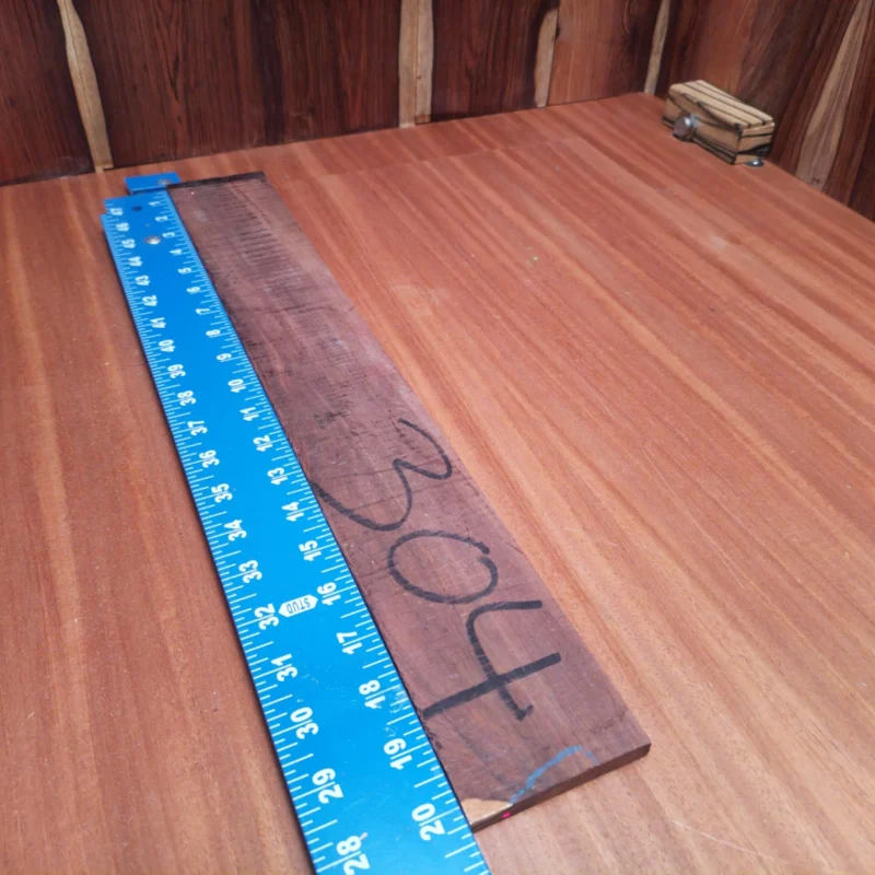 Honduran Rosewood Acoustic Rift Sawn Fingerboard Blank 0.3" X 2.8" X 20.2" - HRAFBR000102 3 Elevate your crafting game with our Honduran Rosewood fingerboards blank. This stunning piece features rift sawn grain that blends beauty and durability, perfect for luthiers seeking quality materials. Deliver smooth playability and striking aesthetics for your next acoustic masterpiece. Its rich, warm tones make every note resonate beautifully, ensuring your creation stands out. Ideal for both seasoned and beginner luthiers, this fingerboard blank is your next essential ingredient for success! It is a Honduran Rosewood Acoustic Rift Sawn fingerboard blank with dimensions of 20.2 x 2.8 x 0.3 inches.