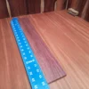 Elevate your luthiery game with this stunning Honduran rosewood blank. Perfectly rift sawn, it offers an ideal balance of density and resonance, making it a top choice for crafting exquisite acoustic instruments. This stunning piece not only enhances tonality but also adds beautiful aesthetics that will make your creations stand out. Whether you're a seasoned artisan or a passionate beginner, this quality wood supports creativity and excellent sound quality. It is a Honduran Rosewood Acoustic Rift Sawn fingerboard blank with dimensions of 20.2 x 3.0 x 0.4 inches.