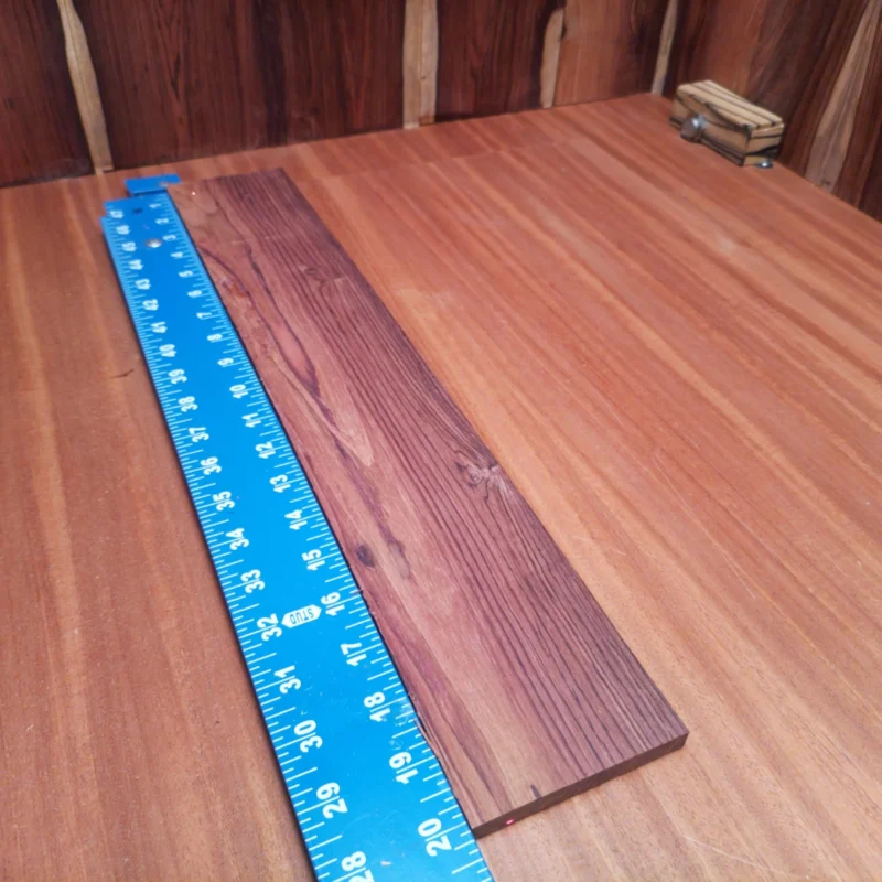 Elevate your instrument-building game with this Honduran Rosewood blank. Known for its rich tonal properties and stunning grain, this Rift Sawn piece is perfect for luthiers seeking a robust sound. Ideal for acoustic guitar backs and sides, it will enhance the resonance of your creations. Get ready to impress musicians with a beautiful, quality instrument that stands out in both performance and appearance. It is a Honduran Rosewood Acoustic Rift Sawn fingerboard blank with dimensions of 20.1 x 3.4 x 0.4 inches.
