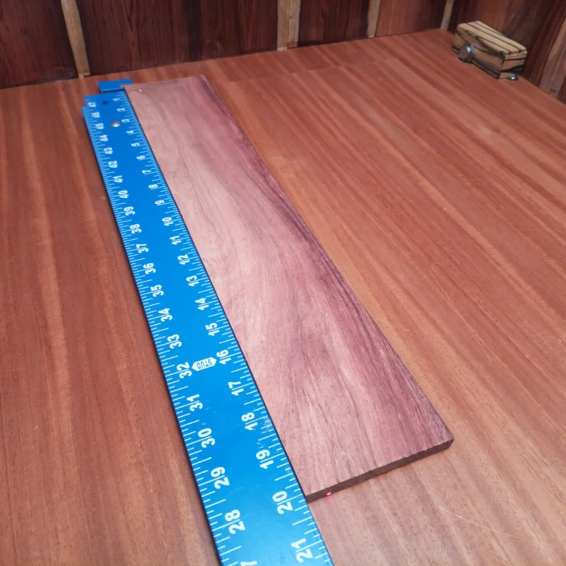 Craft your next masterpiece with this Honduran Rosewood fingerboard blank! Known for its rich, warm tones and incredible resonance, it’s perfect for luthiers seeking quality. The rift sawn design ensures stability and unique aesthetics in every build. Elevate your acoustic instruments with this premium fingerboard that combines style, durability, and top-notch sound. Get ready to make your guitar shine! It is a Honduran Rosewood Acoustic Rift Sawn fingerboard blank with dimensions of 20.0 x 3.7 x 0.4 inches.