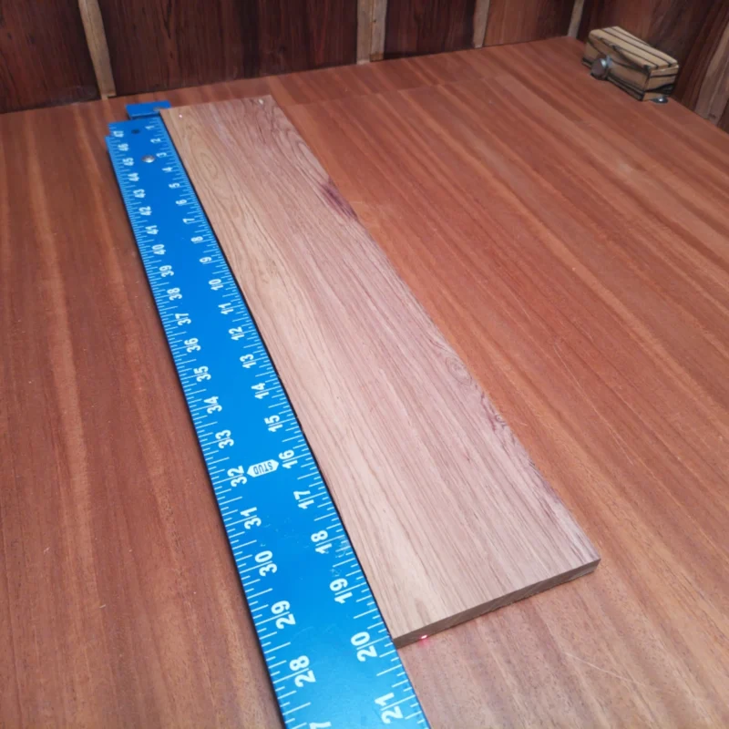 Elevate your luthiery game with this Honduran Rosewood fingerboard blank, perfect for crafting high-quality acoustic instruments. Its rift-sawn grain offers unparalleled stability and striking aesthetics, ensuring a refined touch to any guitar. Gaining popularity in the luthier community, this material promises to enhance tone and playability, making it an essential addition to your workshop. Create your masterpiece with a wood that harmonizes beauty and functionality! It is a Honduran Rosewood Acoustic Rift Sawn fingerboard blank with dimensions of 20.0 x 4.0 x 0.4 inches.