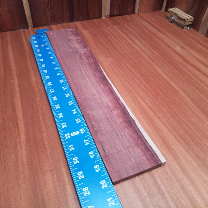 Crafted from genuine Honduran Rosewood, this fingerboard blank boasts stunning grain patterns and optimum resonance. Perfect for luthiers, it ensures a smooth touch and exceptional playability. Measuring 0.4" x 3.5" x 20.0", this durable blank allows for incredible creativity in acoustic guitar design while enhancing tonal richness. Upgrade your instrument with this sought-after wood - your acoustic work will shine! It is a Honduran Rosewood Acoustic Rift Sawn fingerboard blank with dimensions of 20.0 x 3.5 x 0.4 inches.