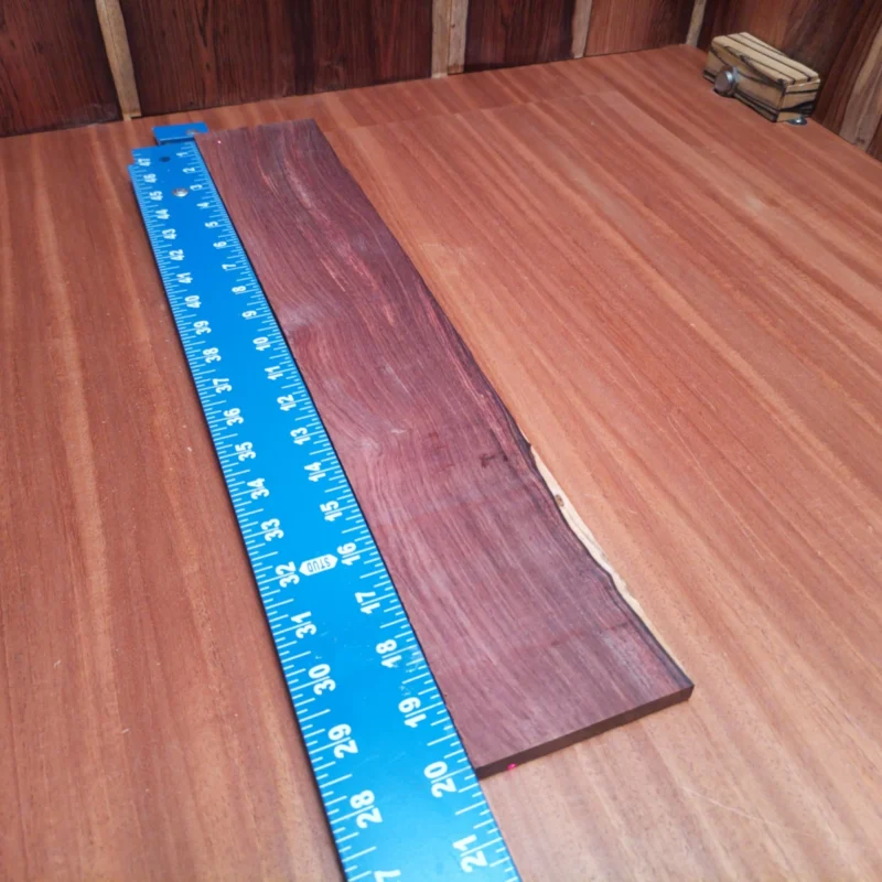 Elevate your next acoustic project with this Honduran Rosewood blank. Known for its rich tone and striking visual appeal, it promises to enhance sound quality while adding a touch of elegance. Perfect for luthiers seeking an incredible foundation for their custom instruments, it boasts durability and an eye-catching grain that draws attention. Get ready to impress with high-quality craftsmanship using this remarkable wood! It is a Honduran Rosewood Acoustic Rift Sawn fingerboard blank with dimensions of 20.0 x 3.4 x 0.4 inches.