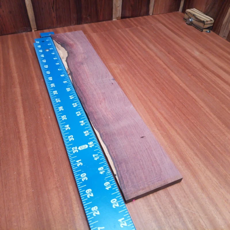 Elevate your next acoustic project with this Honduran Rosewood blank. Known for its rich tone and striking visual appeal, it promises to enhance sound quality while adding a touch of elegance. Perfect for luthiers seeking an incredible foundation for their custom instruments, it boasts durability and an eye-catching grain that draws attention. Get ready to impress with high-quality craftsmanship using this remarkable wood! It is a Honduran Rosewood Acoustic Rift Sawn fingerboard blank with dimensions of 20.0 x 3.4 x 0.4 inches.