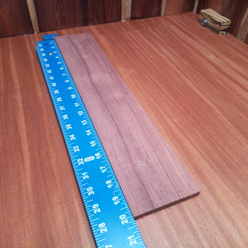 Craft your next masterpiece with this Honduran Rosewood fingerboard blank! This premium wood enhances resonance and looks stunning in any instrument. Perfect for luthiers who want a blend of durability and beauty, this blank is carefully selected to provide an easy working experience. Whether you're designing a new acoustic or upgrading an existing piece, this fingerboard is the ideal choice to elevate your sound and craftsmanship! It is a Honduran Rosewood Acoustic Rift Sawn fingerboard blank with dimensions of 20.0 x 3.7 x 0.4 inches.